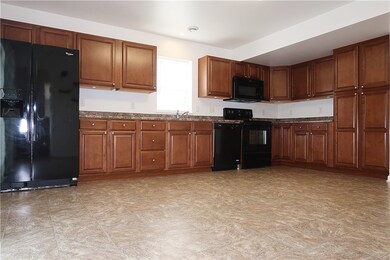 Abundance of Gorgeous Cherry Cabinetry with Pantri