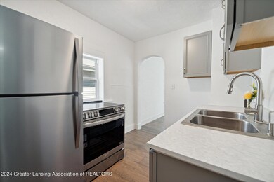 06-1030-May-St-Lansing-MI-48906-WindowSt