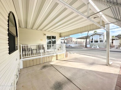 LARGE CARPORT AREA