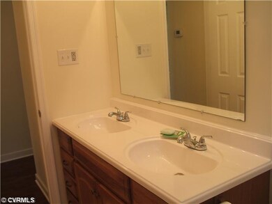 Other - Bathroom has double vanity, counter height