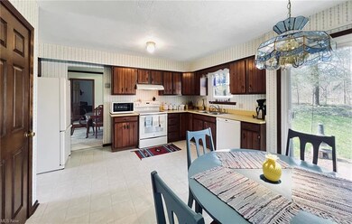 Kitchen with slider leading to outside patio