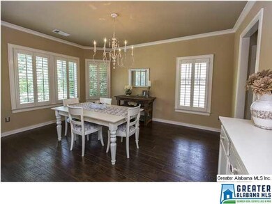 Formal dining complete with Gorgeous Hardwoods, up