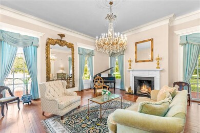The parlor on the left with exquisite millwork.