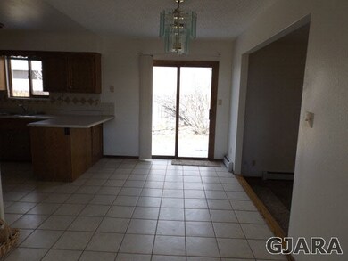 Nice Tile floors open to Kitchen and Living Room