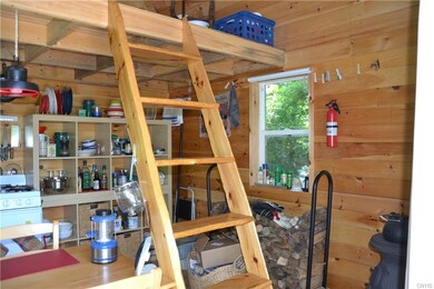 Ladder to the loft area and half bath