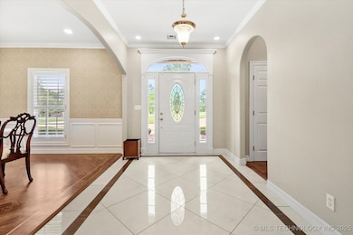 Entry Hall leads to formal dining and to office