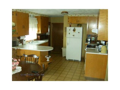 Kitchen. Kitchen dining area with birch cabinets n