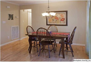 Dining room with crown molding.