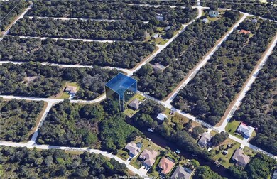 Aerial overview of property's location with nearby suburban area