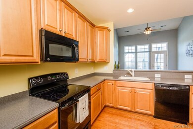 KITCHEN W/ CORIAN COUNTER-TOPS, MATCHING APPLIANCE
