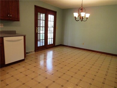 Open concept kitchen/dining room provides plenty o