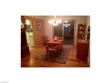 Spacious Dining Room with sliding door to 3-season