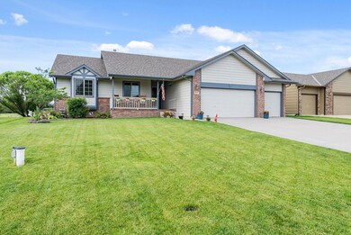 4 Bed, 3 Bath, 3 Car Garage on Lake Lot in Maize S