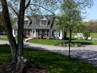 Exterior Front. beautifully landscaped 1.4 acres  