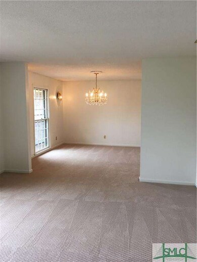 living and dining area with new carpet and paint