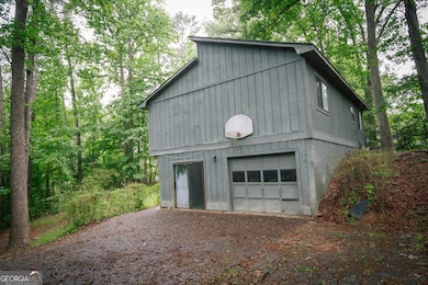 There is a large parking area on the side of the house.