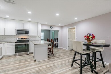 Open kitchen with white cabinetry (soft closing), 