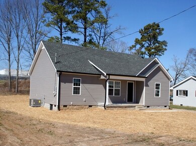 1420 sqft of living area, 85 ft covered front porch