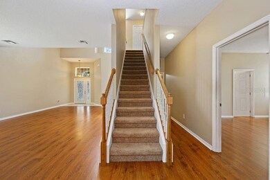 stairway with wood railing - view into the Master 