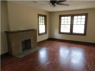 Hardwood floors natural woodwork.