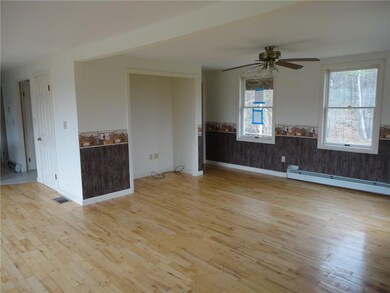 LIVING ROOM LOOKING TO THE...