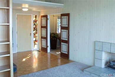 Front door entrance, to the right is a double door