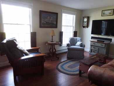 Beautiful wood floors cover much of...