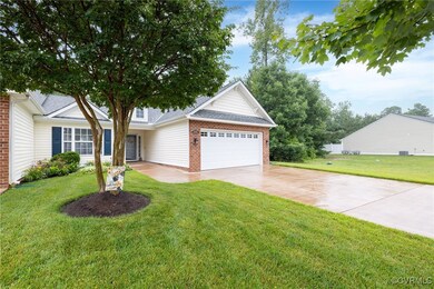 Nice two car concrete driveway and attached garage