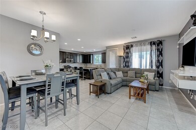 Living area with recessed lighting, baseboards, li