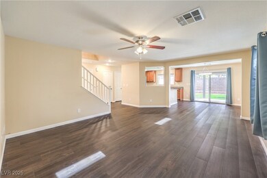 Unfurnished living room featuring stairs, a ceilin