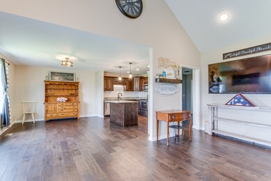 Wonderful open concept living! Living room TV conveys with home