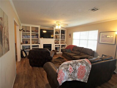 Living room - built in bookcases, fireplace