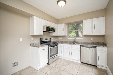 Kitchen is equipped with brand new appliances