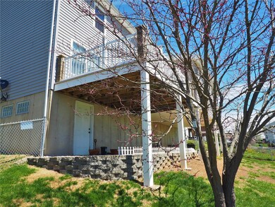 Walk-out lower level with landscaped patio area, c
