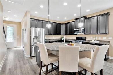 BEAUTIFUL UPGRADED KITCHEN WITH HUGE CENTER ISLAND