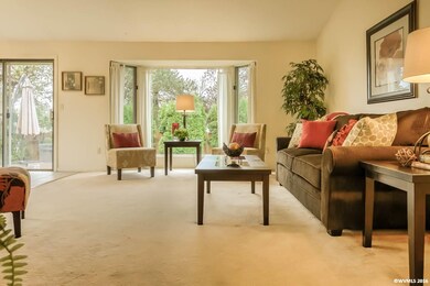 Sliders and picture windows bring the outdoors in.