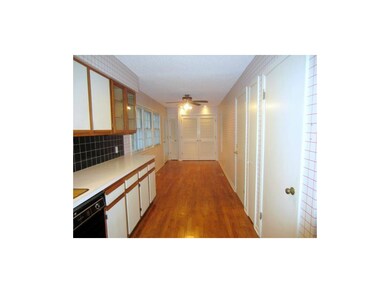 Kitchen, Spacious Eating area, and laundry behind 