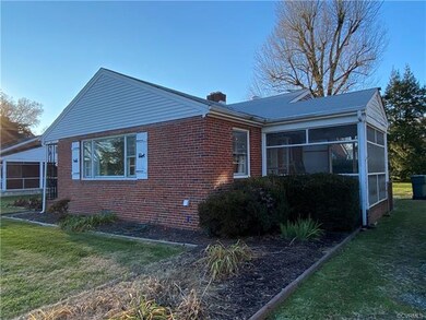 Side screened porch off of kitchen.