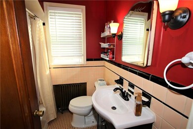 Full Bath on Main Level has Ceramic Tile Half Wall