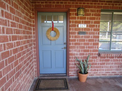 Quaint front entry of front home