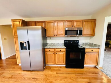Kitchen with newer refrigerator