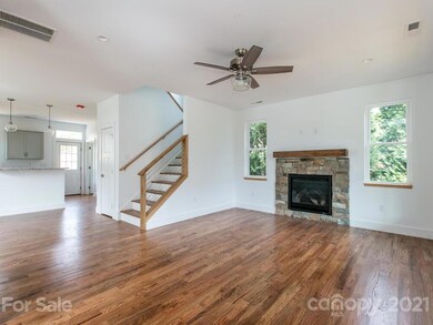 Hardwood Floors, Gas Fireplace and Custom Railing