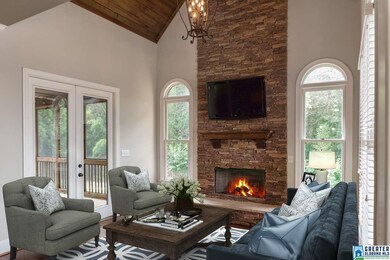 Soaring wood ceilings, gorgeous floor to ceiling s