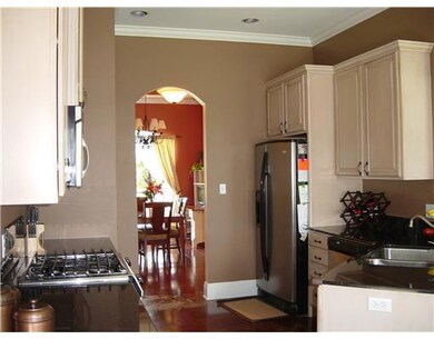 Kitchen. View from kitchen into dining room.