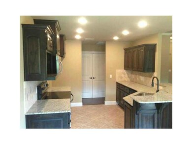 Exterior Front. custom lighting package