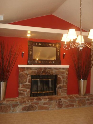 Stone Fireplace and Vaulted Ceiling