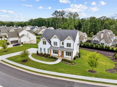 Modern farmhouse featuring a standing seam roof, a residential view, covered porch, and a front lawn