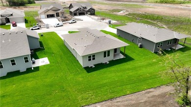 1838 Woodward Cir, Raymore, MO 64083 - photo 2