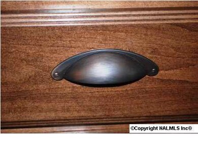 Upgraded cabinet hardware and pulls.