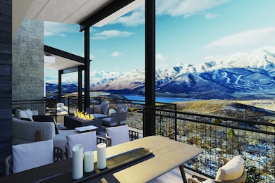 Balcony with an outdoor living space with a fire pit, a water and mountain view, and outdoor dining area